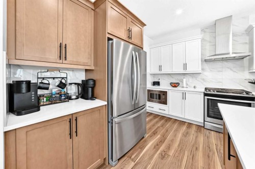 142 Lucas Terrace Nw, Calgary, AB - Indoor Photo Showing Kitchen With Stainless Steel Kitchen With Upgraded Kitchen