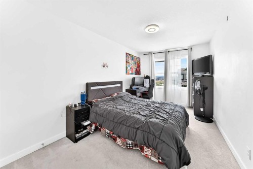 142 Lucas Terrace Nw, Calgary, AB - Indoor Photo Showing Bedroom