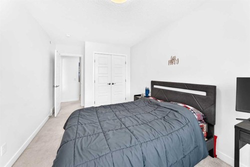 142 Lucas Terrace Nw, Calgary, AB - Indoor Photo Showing Bedroom