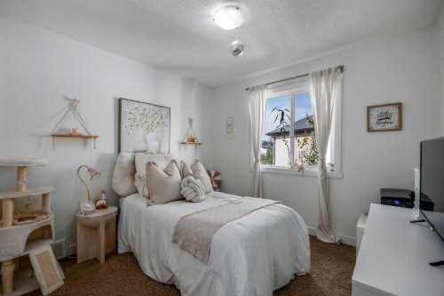 58 Copperstone Close Se, Calgary, AB - Indoor Photo Showing Bedroom
