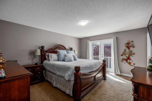 58 Copperstone Close Se, Calgary, AB - Indoor Photo Showing Bedroom