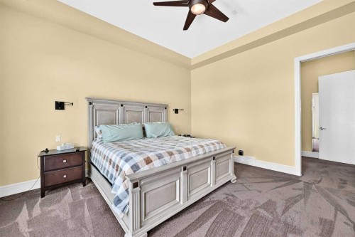 109 Waters Edge Drive, Heritage Pointe, AB - Indoor Photo Showing Bedroom