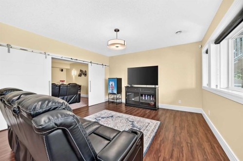 109 Waters Edge Drive, Heritage Pointe, AB - Indoor Photo Showing Living Room