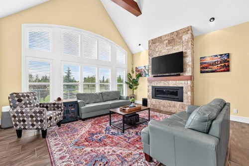 109 Waters Edge Drive, Heritage Pointe, AB - Indoor Photo Showing Living Room With Fireplace