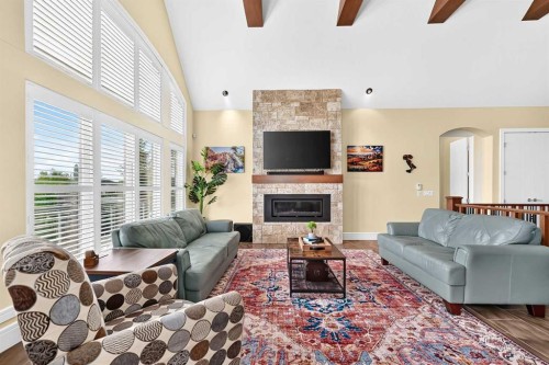 109 Waters Edge Drive, Heritage Pointe, AB - Indoor Photo Showing Living Room With Fireplace