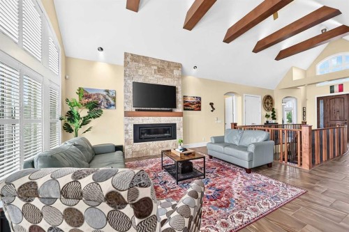 109 Waters Edge Drive, Heritage Pointe, AB - Indoor Photo Showing Living Room With Fireplace