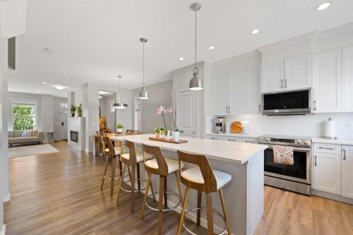 79 Legacy Glen Row Se, Calgary, AB - Indoor Photo Showing Kitchen With Upgraded Kitchen