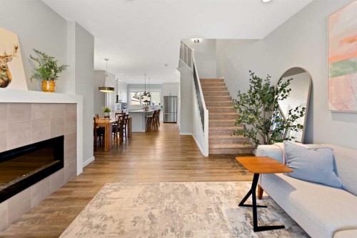 79 Legacy Glen Row Se, Calgary, AB - Indoor Photo Showing Living Room With Fireplace