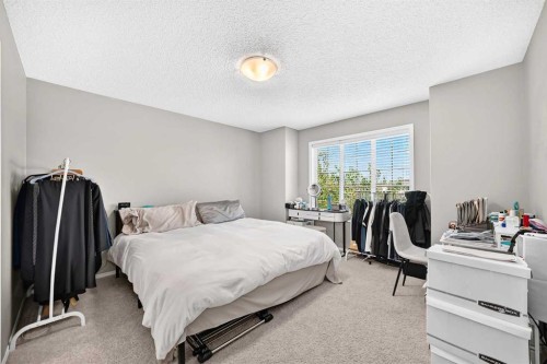 162 Cranford Common Se, Calgary, AB - Indoor Photo Showing Bedroom