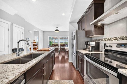162 Cranford Common Se, Calgary, AB - Indoor Photo Showing Kitchen With Stainless Steel Kitchen With Double Sink With Upgraded Kitchen