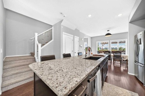 162 Cranford Common Se, Calgary, AB - Indoor Photo Showing Kitchen With Stainless Steel Kitchen With Double Sink With Upgraded Kitchen