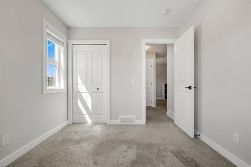 102 Midgrove Sw, Airdrie, AB - Indoor Photo Showing Other Room