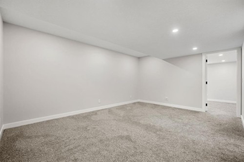 102 Midgrove Sw, Airdrie, AB - Indoor Photo Showing Other Room