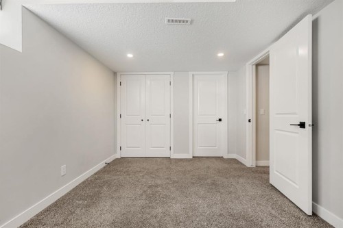 102 Midgrove Sw, Airdrie, AB - Indoor Photo Showing Other Room