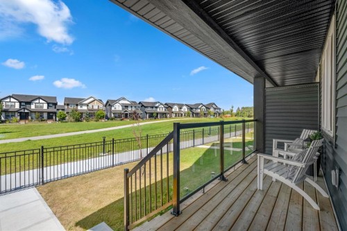 102 Midgrove Sw, Airdrie, AB - Outdoor With Deck Patio Veranda With Exterior