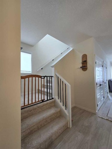 431 Rowmont Boulevard Nw, Calgary, AB - Indoor Photo Showing Other Room