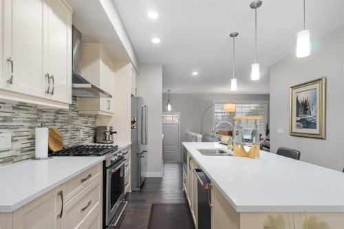 185 Cranbrook Villas Se, Calgary, AB - Indoor Photo Showing Kitchen With Double Sink With Upgraded Kitchen