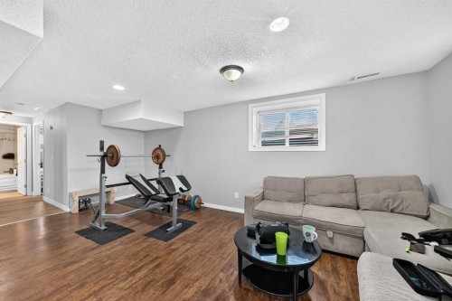 80 Pensville Road Se, Calgary, AB - Indoor Photo Showing Gym Room