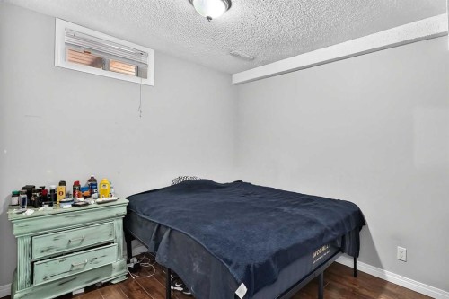 80 Pensville Road Se, Calgary, AB - Indoor Photo Showing Bedroom