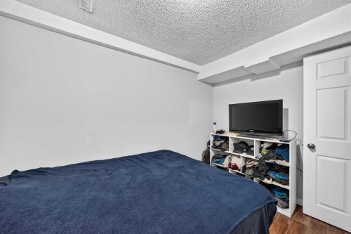 80 Pensville Road Se, Calgary, AB - Indoor Photo Showing Bedroom