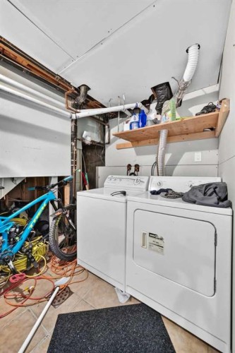 80 Pensville Road Se, Calgary, AB - Indoor Photo Showing Laundry Room