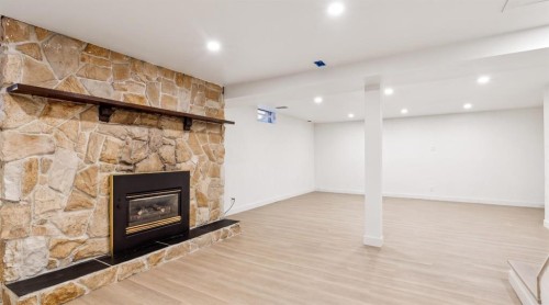 618 Oakhill Place Sw, Calgary, AB - Indoor With Fireplace