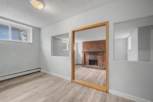 4004 79 Street Nw, Calgary, AB - Indoor With Fireplace