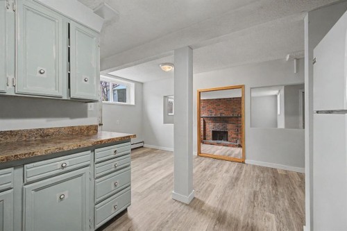 4004 79 Street Nw, Calgary, AB - Indoor Photo Showing Other Room With Fireplace
