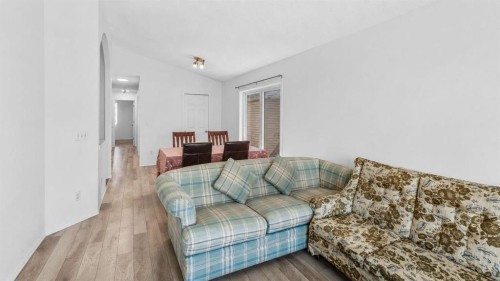 247 Taracove Estate Drive Ne, Calgary, AB - Indoor Photo Showing Living Room