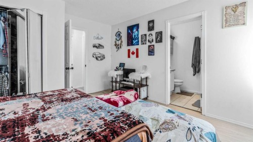 247 Taracove Estate Drive Ne, Calgary, AB - Indoor Photo Showing Bedroom