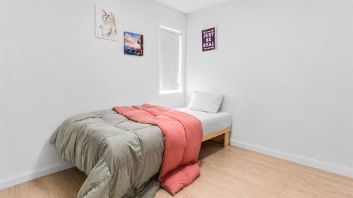 247 Taracove Estate Drive Ne, Calgary, AB - Indoor Photo Showing Bedroom