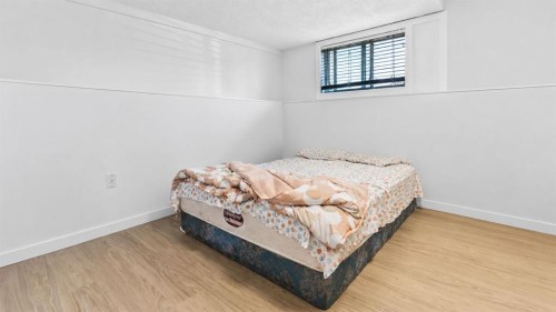 247 Taracove Estate Drive Ne, Calgary, AB - Indoor Photo Showing Bedroom