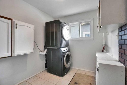 5404 Valentine Crescent Se, Calgary, AB - Indoor Photo Showing Laundry Room