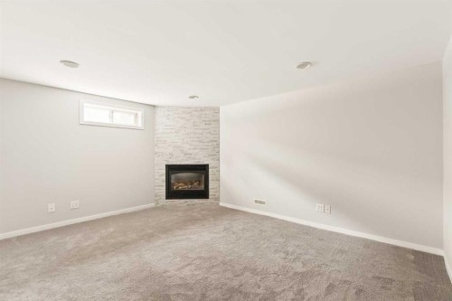 27 Gateway Drive Sw, Calgary, AB - Indoor With Fireplace