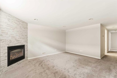 27 Gateway Drive Sw, Calgary, AB - Indoor With Fireplace