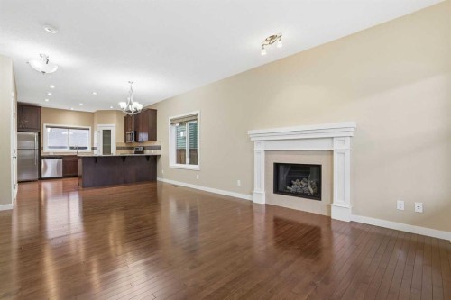 37 Nolanfield Manor Nw, Calgary, AB - Indoor Photo Showing Living Room With Fireplace