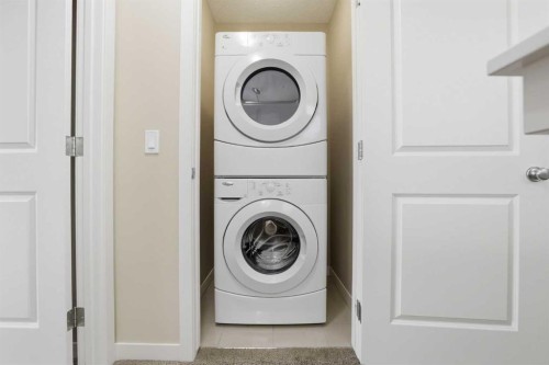 37 Nolanfield Manor Nw, Calgary, AB - Indoor Photo Showing Laundry Room