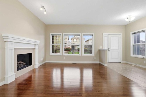 37 Nolanfield Manor Nw, Calgary, AB - Indoor Photo Showing Living Room With Fireplace