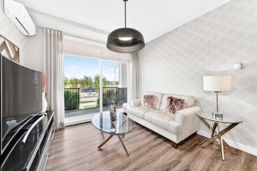 120-10 Walgrove Se, Calgary, AB - Indoor Photo Showing Living Room