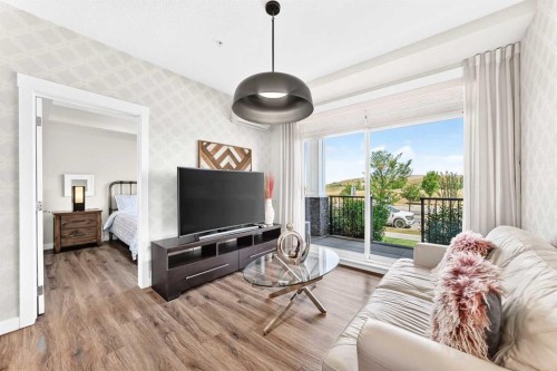120-10 Walgrove Se, Calgary, AB - Indoor Photo Showing Living Room