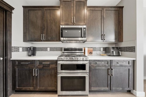 2632 Ravenslea Gardens Se, Airdrie, AB - Indoor Photo Showing Kitchen