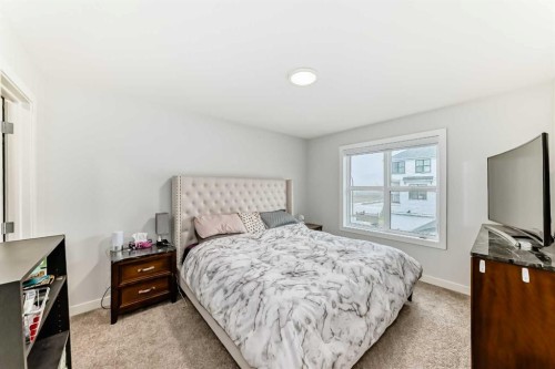 13 Treeline Avenue Sw, Calgary, AB - Indoor Photo Showing Bedroom