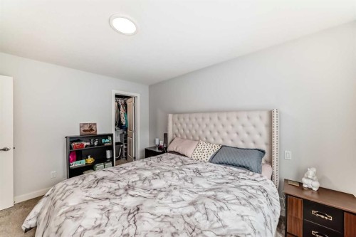13 Treeline Avenue Sw, Calgary, AB - Indoor Photo Showing Bedroom