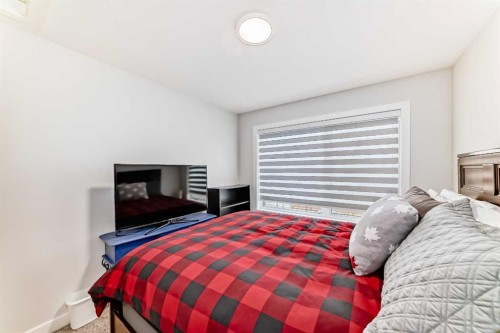 13 Treeline Avenue Sw, Calgary, AB - Indoor Photo Showing Bedroom