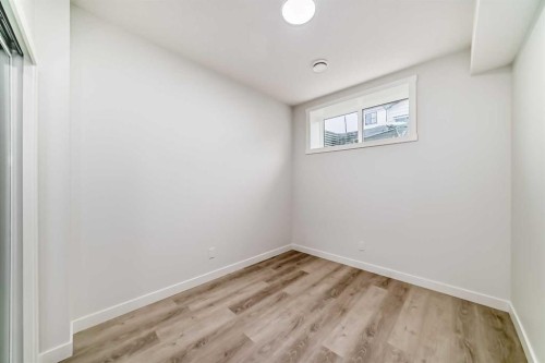 13 Treeline Avenue Sw, Calgary, AB - Indoor Photo Showing Other Room