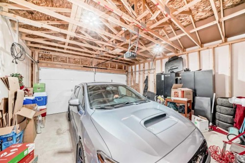 13 Treeline Avenue Sw, Calgary, AB - Indoor Photo Showing Garage