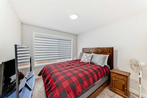 13 Treeline Avenue Sw, Calgary, AB - Indoor Photo Showing Bedroom