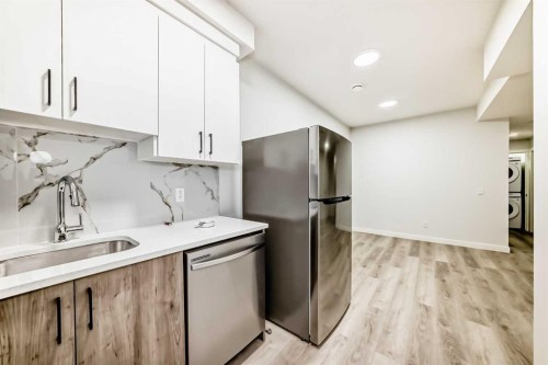 13 Treeline Avenue Sw, Calgary, AB - Indoor Photo Showing Kitchen