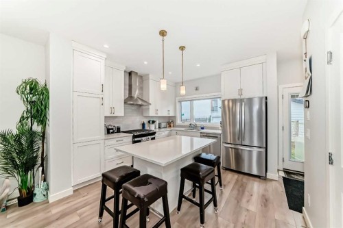 13 Treeline Avenue Sw, Calgary, AB - Indoor Photo Showing Kitchen With Stainless Steel Kitchen With Upgraded Kitchen