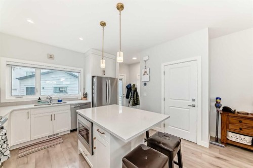 13 Treeline Avenue Sw, Calgary, AB - Indoor Photo Showing Kitchen With Upgraded Kitchen